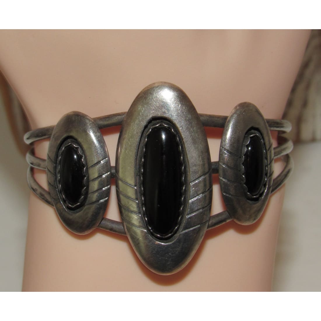 Native American Navajo onyx cuff bracelet with three polished black onyx stones set in silver