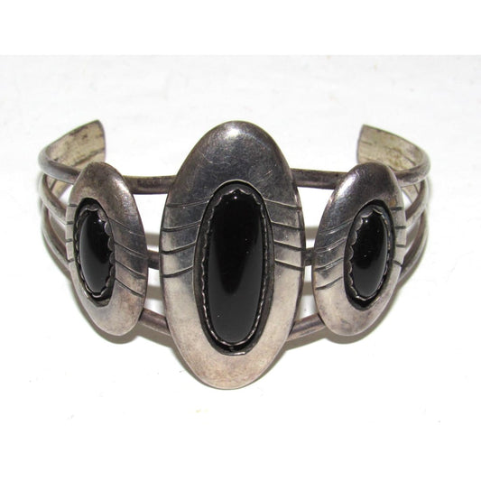 Native American Navajo onyx cuff bracelet featuring three black onyx stones set in silver