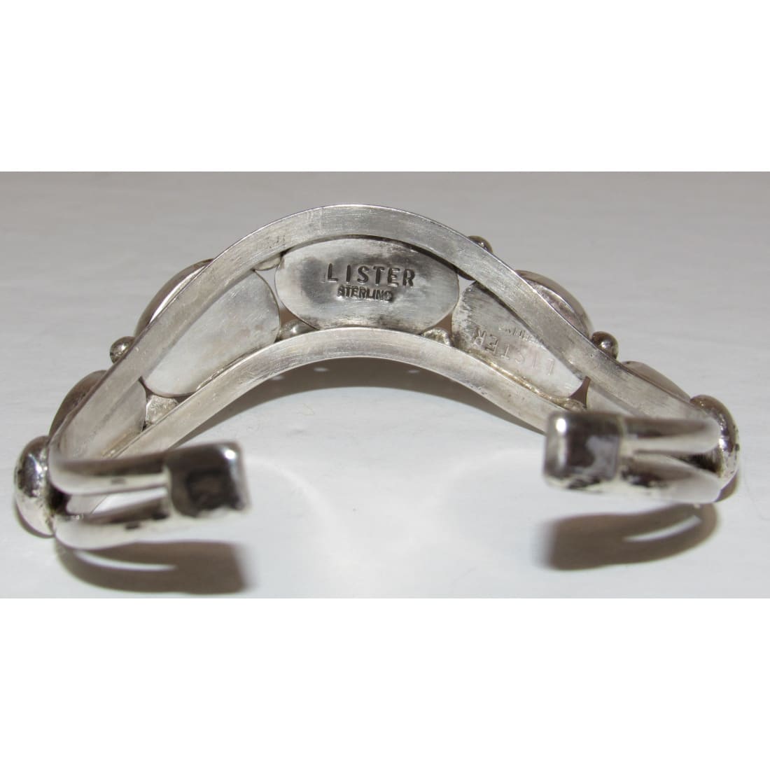 Navajo turquoise spiny oyster cuff bracelet Dave Lister with silver band and stamped hallmark