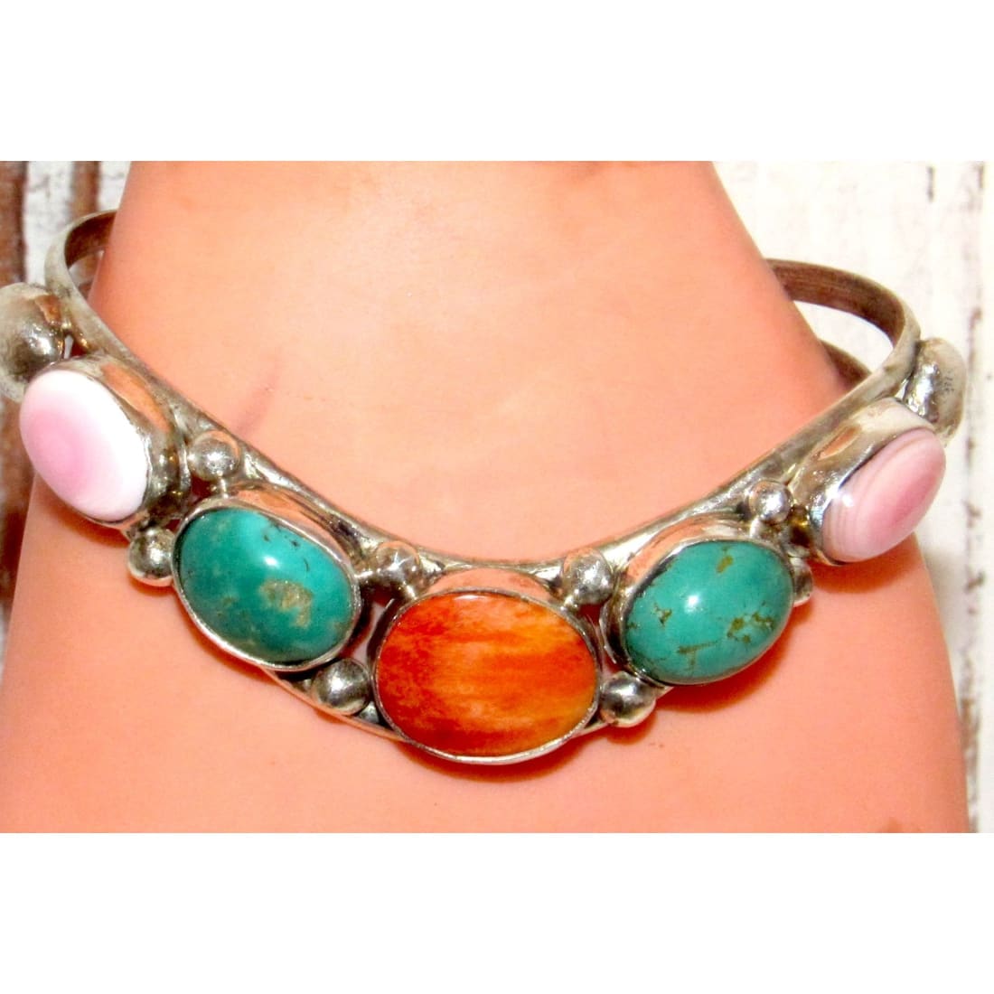 Native American Navajo turquoise spiny oyster cuff bracelet Dave Lister with pink and orange stones