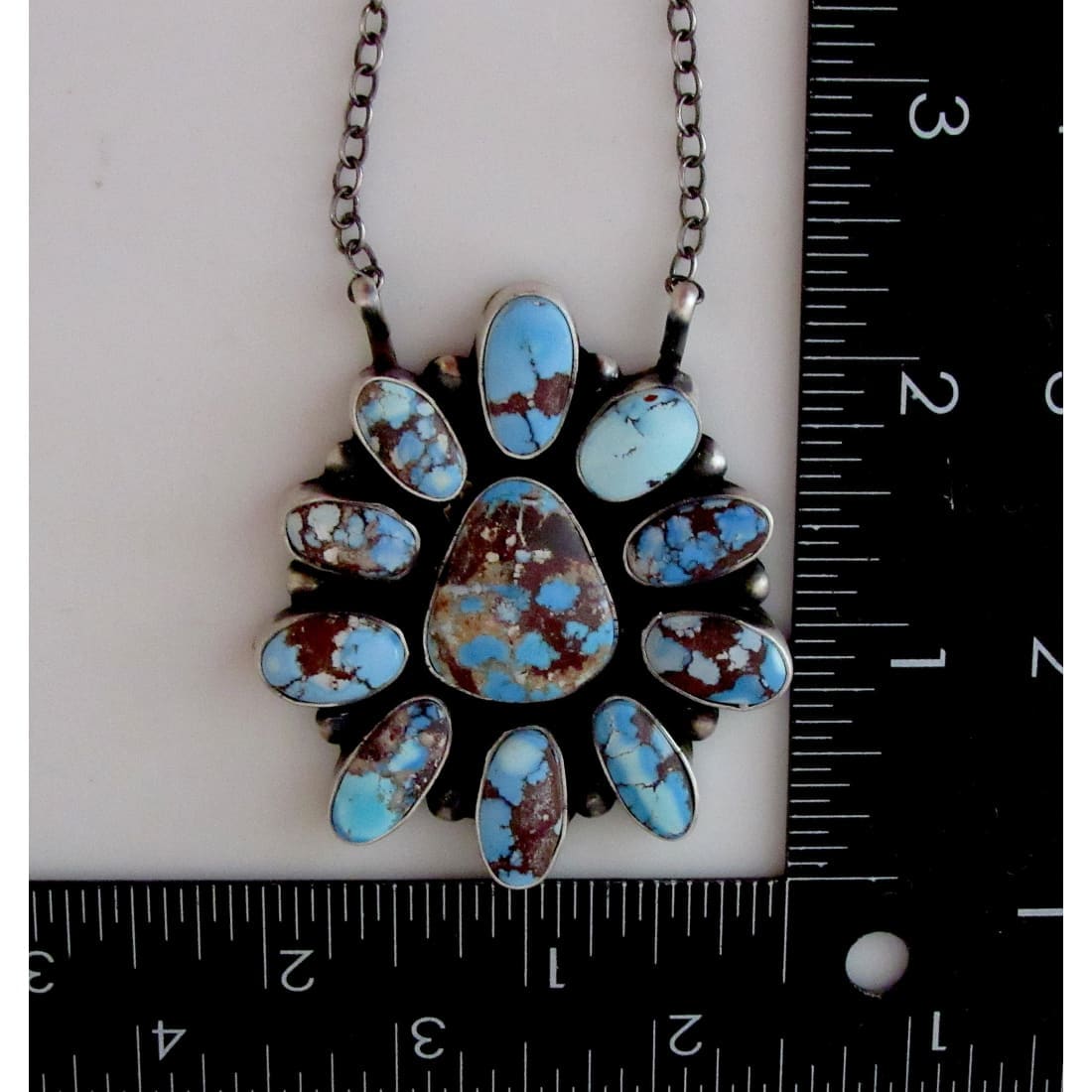 Navajo Golden Hills turquoise bar necklace with blue and brown stones on silver chain measuring size