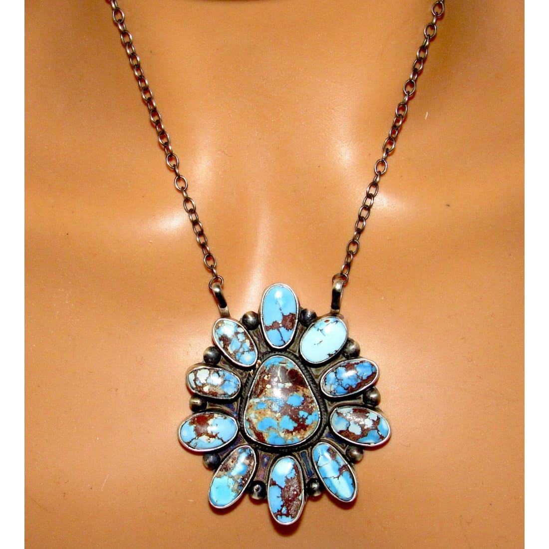Navajo Golden Hills turquoise bar necklace with oval turquoise stones set in silver pendant