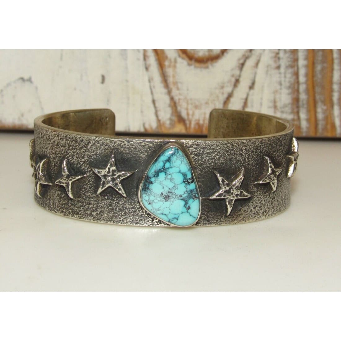 Navajo Spiderweb Kingman Turquoise Tufa Cast Sterling Stars
