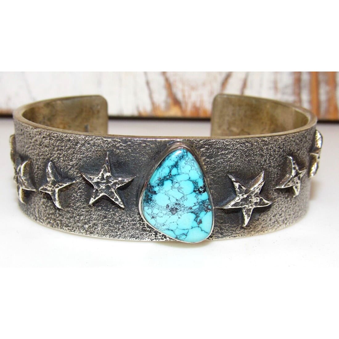 Navajo Spiderweb Kingman Turquoise Tufa Cast Sterling Stars