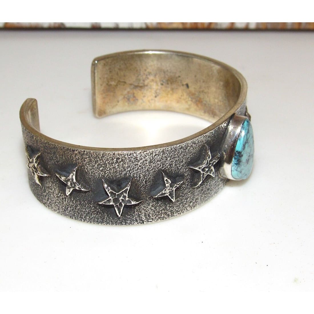 Navajo Spiderweb Kingman Turquoise Tufa Cast Sterling Stars
