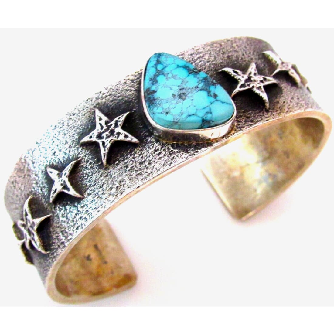 Navajo Spiderweb Kingman Turquoise Tufa Cast Sterling Stars