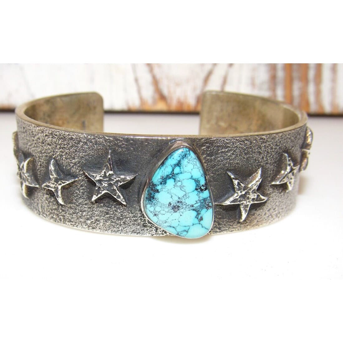 Navajo Spiderweb Kingman Turquoise Tufa Cast Sterling Stars