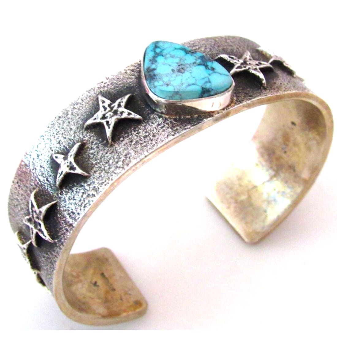 Navajo Spiderweb Kingman Turquoise Tufa Cast Sterling Stars