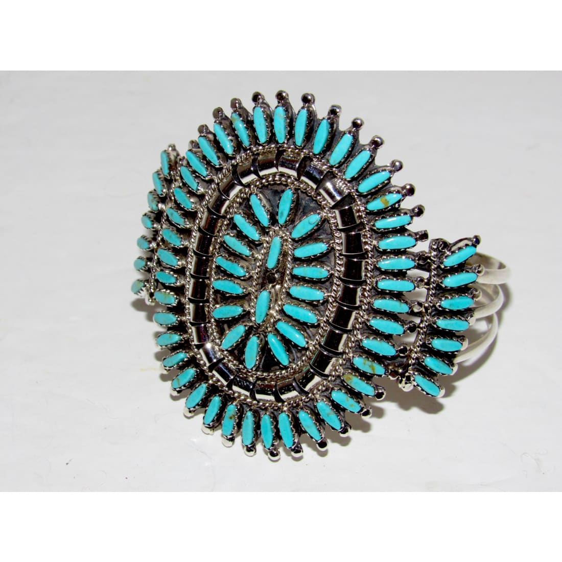 Navajo turquoise cluster cuff bracelet with stunning Sleeping Beauty turquoise and intricate silver design.