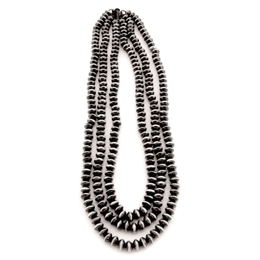 Navajo pearls three strand necklace featuring sterling silver 9mm saucer beads and elegant design.