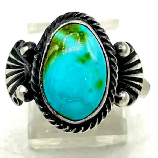 Navajo Royston turquoise ring size 9 in sterling silver by J. Largo, featuring a stunning turquoise stone.