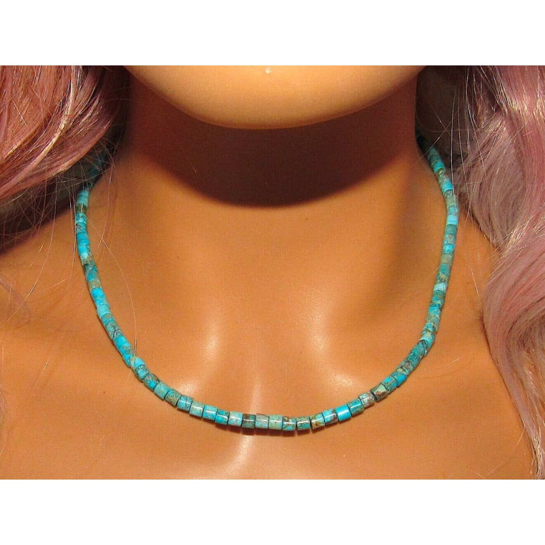 Navajo turquoise heishi choker necklace featuring stunning Kingman turquoise heishi beads in a beautiful arrangement.