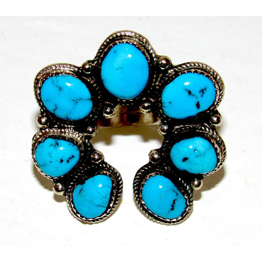 Navajo Turquoise Naja ring size 8 featuring vibrant Kingman turquoise stones set in sterling silver.