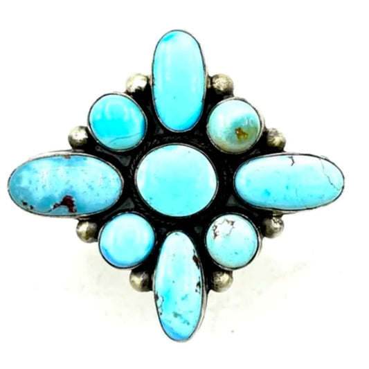 Navajo Golden Hills turquoise cluster ring featuring vibrant turquoise stones set in sterling silver.