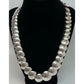 Vintage Navajo pearls necklace earrings set with hand-etched ingot design and graduated pillow beads.