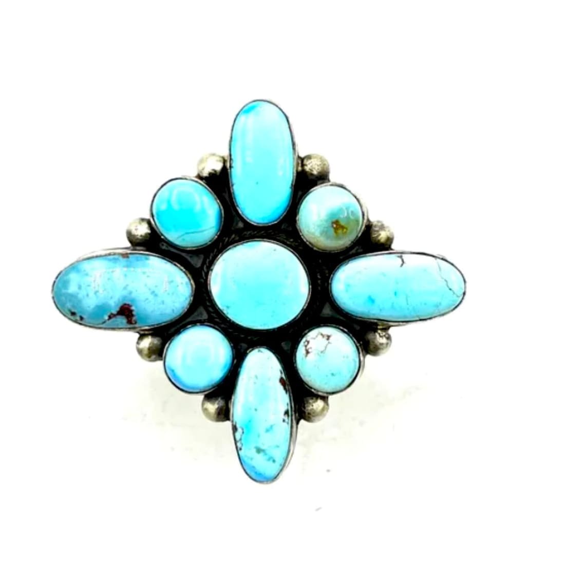 Navajo Golden Hills turquoise cluster ring featuring lavender-blue turquoise stones set in sterling silver.