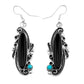 Navajo Onyx Turquoise Dangle Earrings Sterling Silver S. Yazzie showcasing intricate designs and vibrant stones.