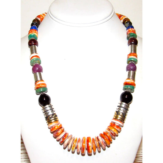 Navajo Tommy Singer orange spiny oyster necklace showcasing vibrant shells and artisan craftsmanship.