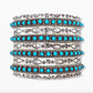 Sterling Zuni turquoise cuff bracelet with detailed silver engravings and multiple turquoise stone rows