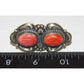 Native American Navajo red spiny oyster ring with two oval stones and intricate silver detailing