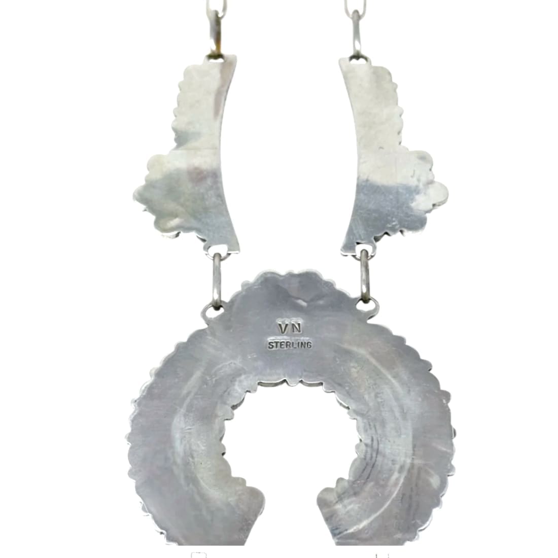 Back view of Native American Navajo turquoise squash blossom necklace made of sterling silver