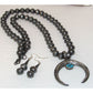 Vintage Navajo squash blossom necklace set with silver beads and turquoise stone pendant with matching earrings