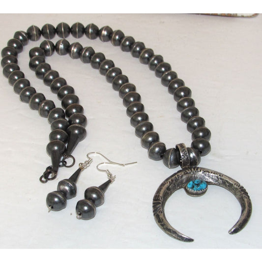 Vintage Navajo squash blossom necklace set with silver beads and turquoise stone pendant with matching earrings