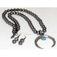 Vintage Navajo squash blossom necklace set with silver beads and turquoise pendant along with matching earrings