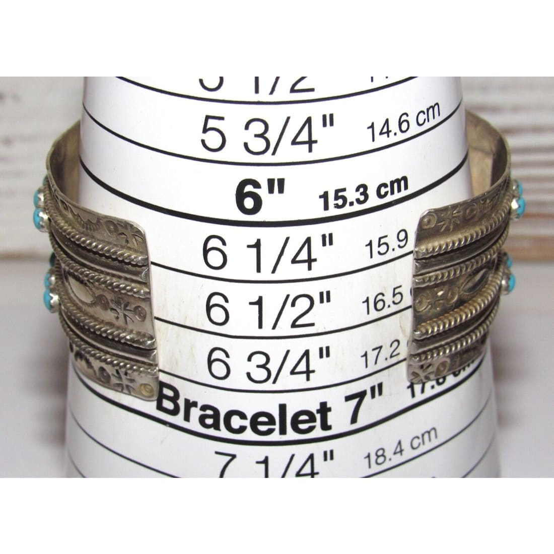 Native American Zuni turquoise snake eye cuff bracelet with intricate silver detailing