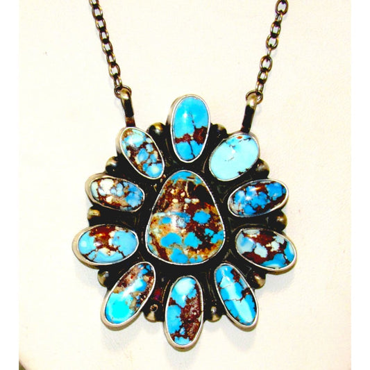Navajo Golden Hills turquoise bar necklace with multiple blue turquoise stones set in silver pendant