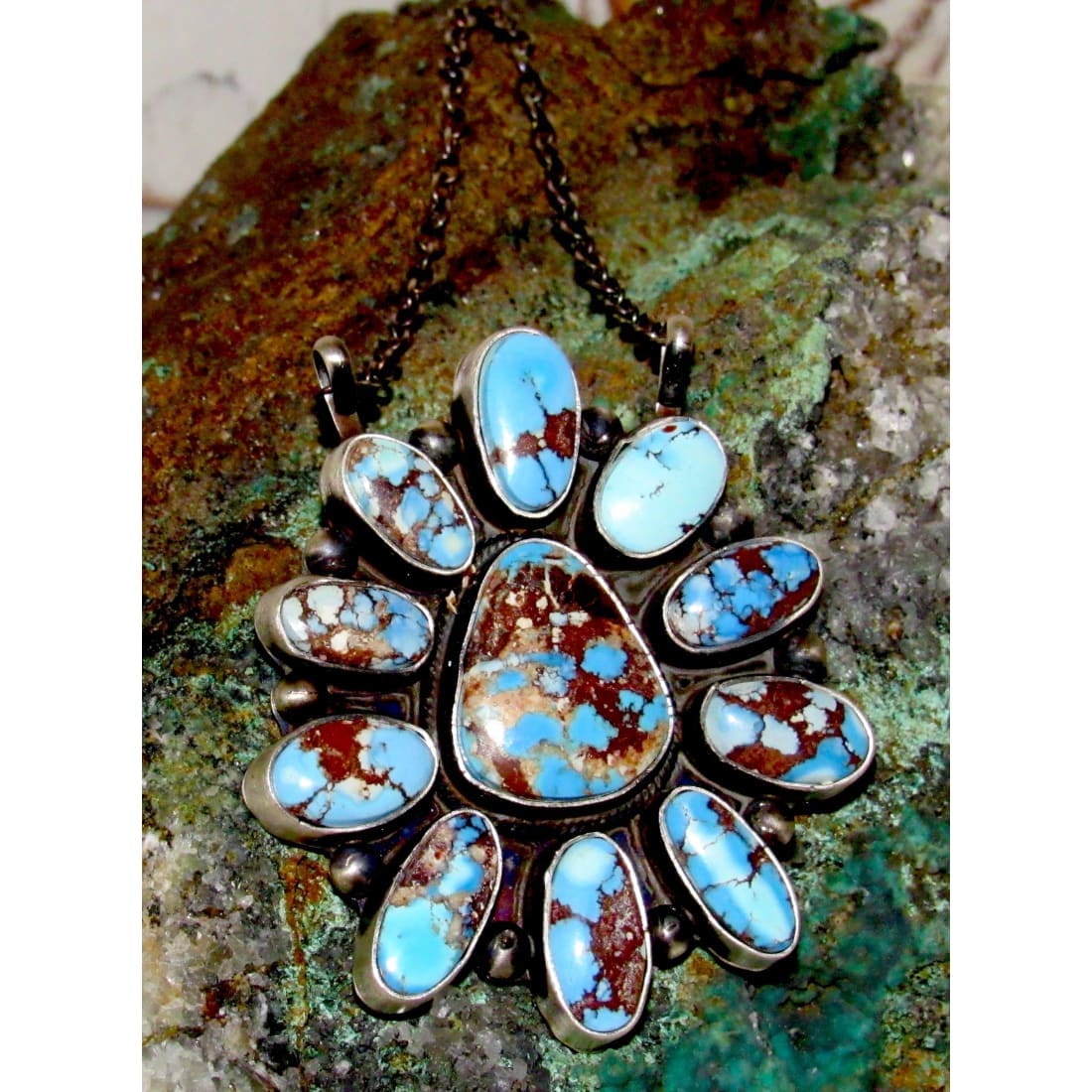 Navajo Golden Hills turquoise bar necklace with multiple blue and brown turquoise stones on silver setting