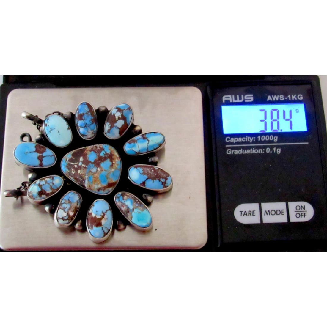 Navajo Golden Hills turquoise bar necklace with multiple turquoise stones on digital scale