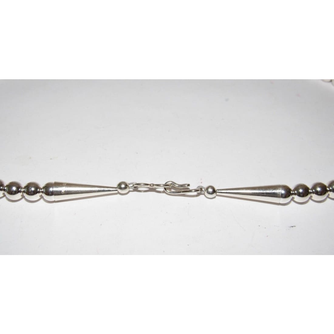 Close-up of Native American Navajo pearls necklace sterling silver clasp and beads