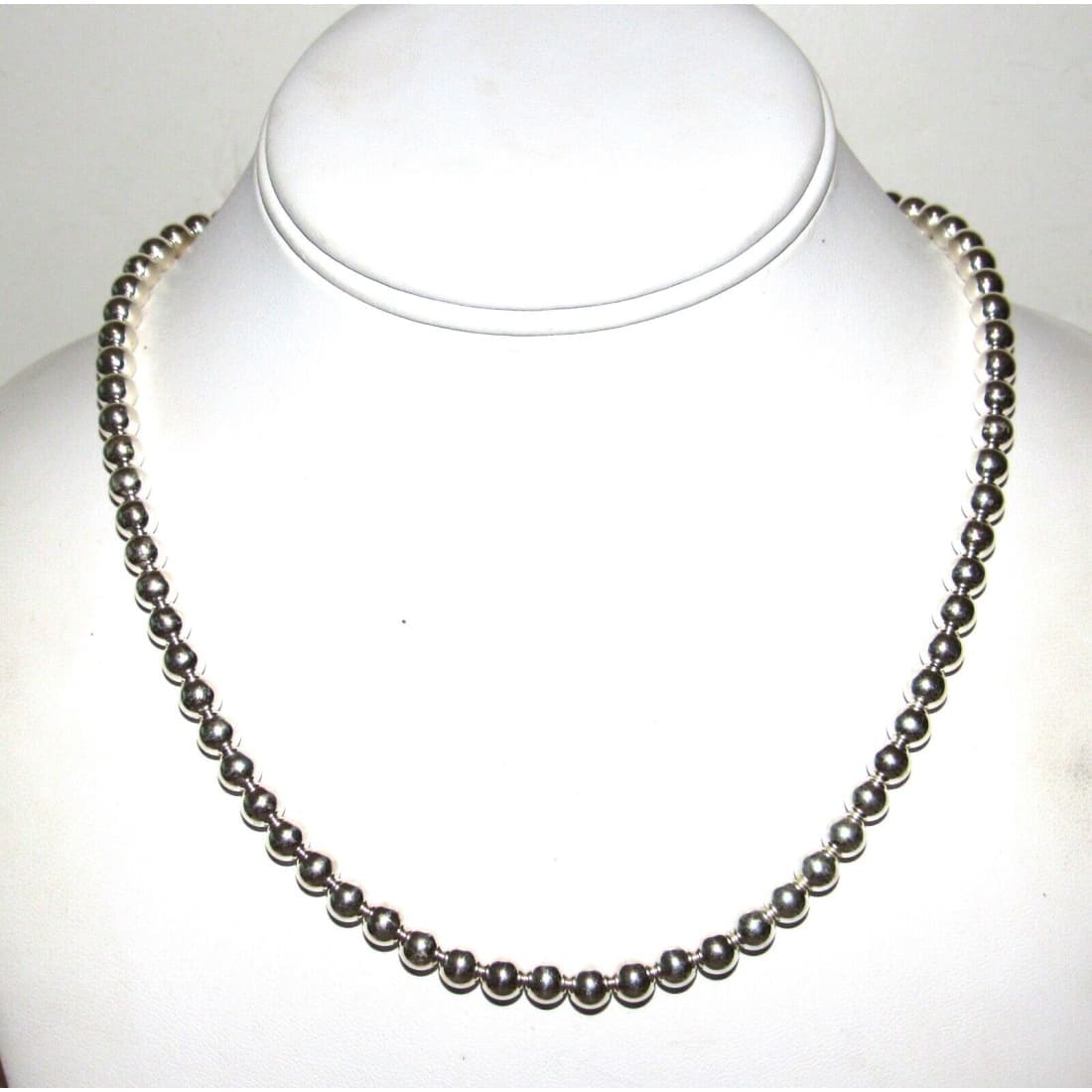 Native American Navajo pearls necklace sterling silver beaded jewelry on white display