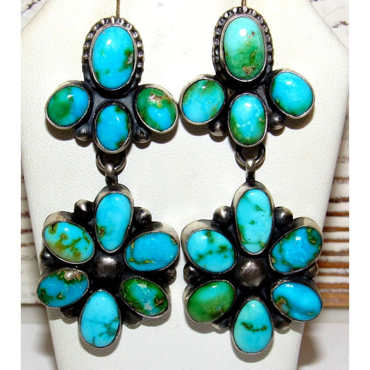 The Southwestern Style Gallery Sonoran gold turquoise dangle earrings with vibrant blue and green stones in silver setting