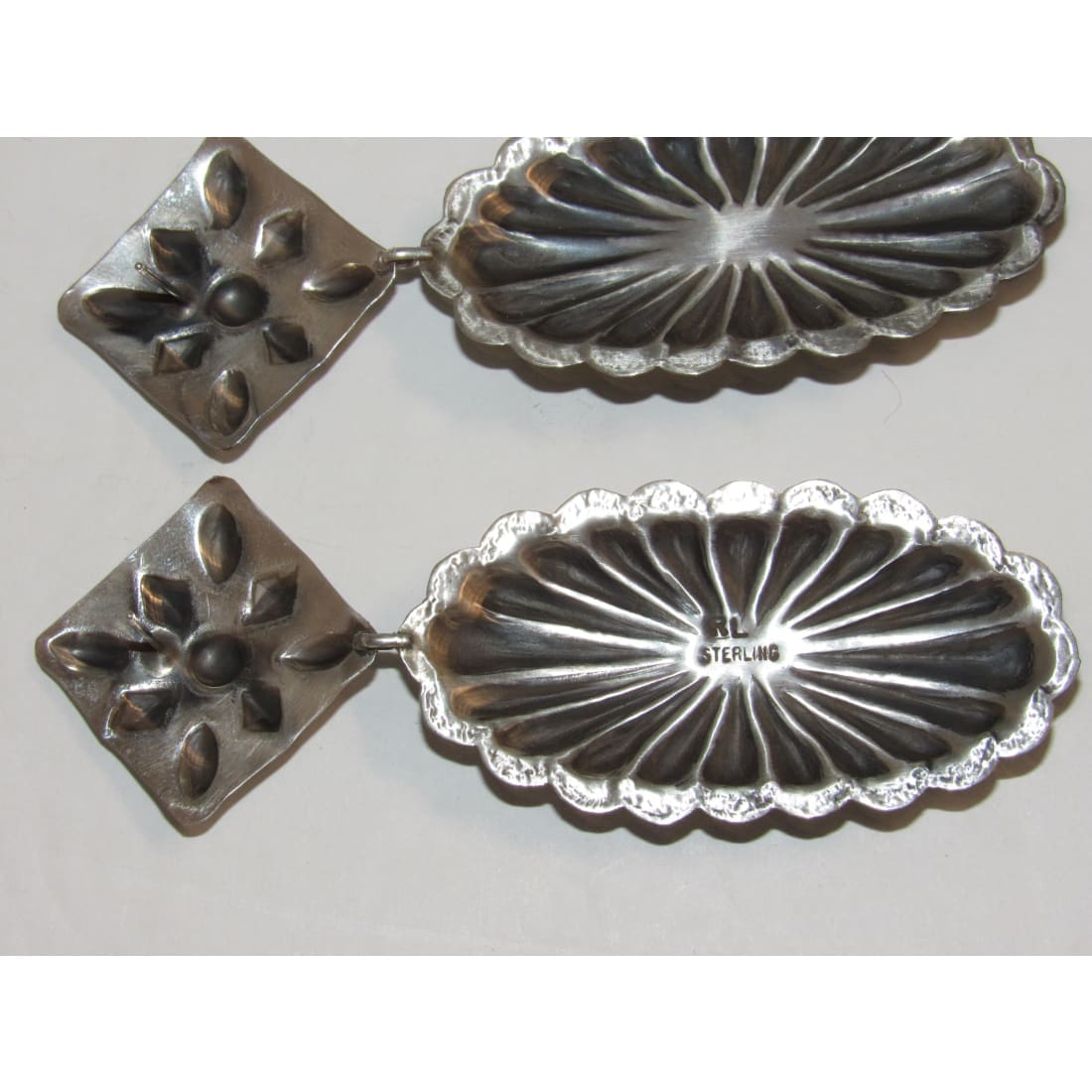 Native American Navajo concho earrings sterling silver with intricate floral and scalloped design