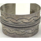 Old Pawn Navajo cuff bracelet with intricate stamped designs and twisted silver rope detailing