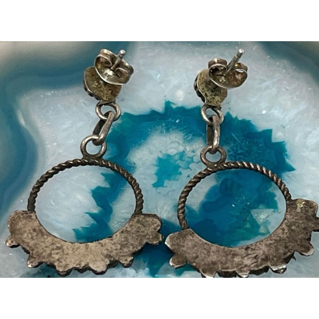 Native American Zuni snake eye turquoise earrings with silver twisted hoop and scalloped design