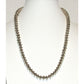 Vintage Navajo pearls necklace with silver beads displayed on white mannequin bust