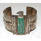 Native American Navajo Thunderbird cuff bracelet with turquoise stone and detailed silverwork